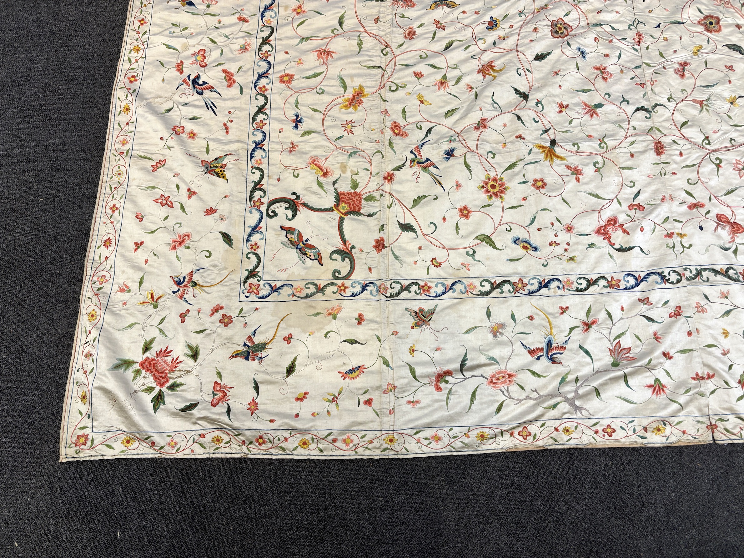 A fine Chinese 19th century silk polychrome embroidered cream silk bed cover, 290cm long x 278cm wide (both curtains together)